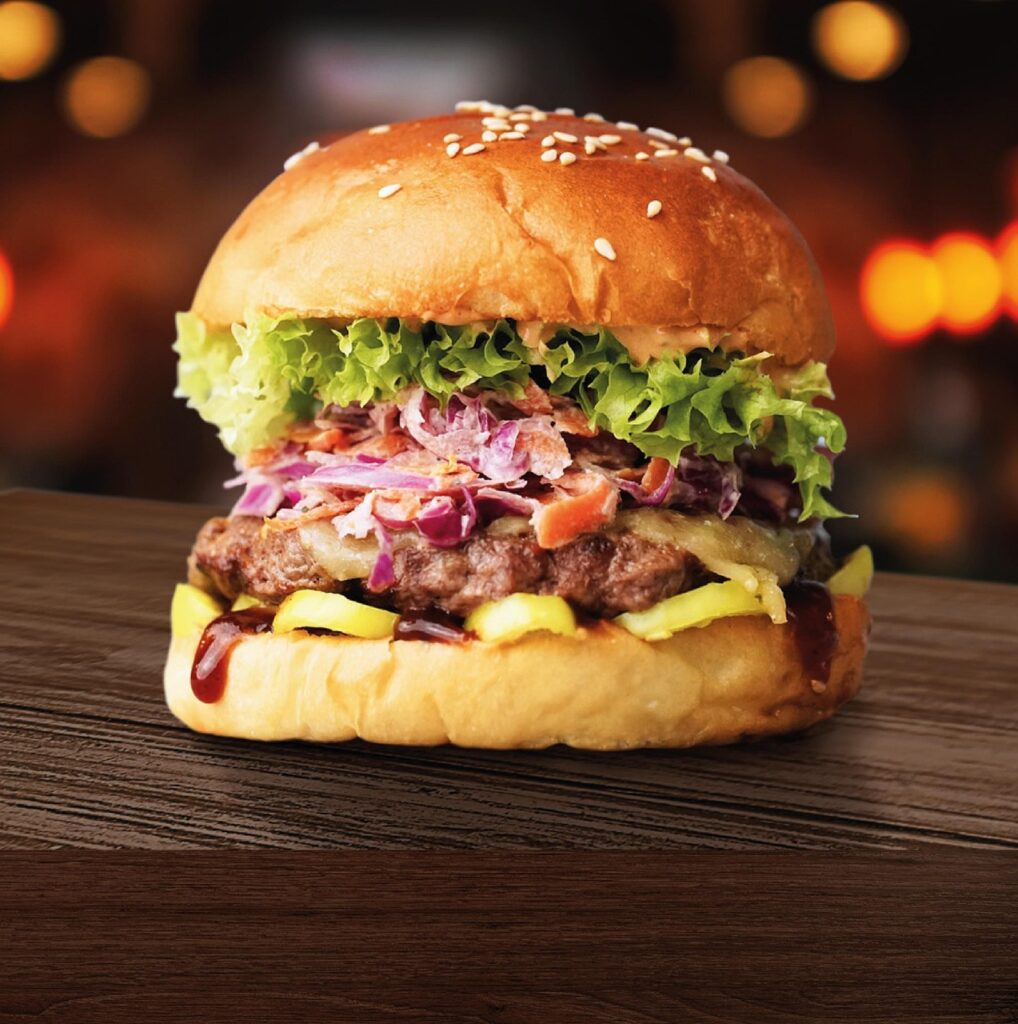 making some of the best Buttery Glazed Donut Burger